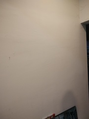 Before photo of TV Mounting by Muharami Enterprise