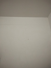 Before photo of TV Mounting by Muharami Enterprise