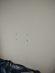 Before photo of TV Mounting by Muharami Enterprise
