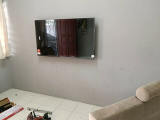 After photo of AEON - TV Mounting by MAG LIVING SPACE