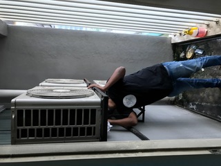 Servicing aircon outdoor unit