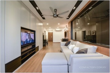 This elegant living space, designed by ICONFACTORY SDN BHD, showcases a contemporary style from the Tiara Faber - Taman Desa project. The room features neutral tones, with a plush white sofa adding a touch of luxury. Polished wooden flooring and high-contrasting dark beams exude sophistication, while the mounted TV and open-plan layout create a seamless living experience. Ideal for those invested in upscale Malaysian interior decor.