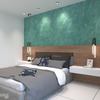 This modern bedroom designed by R Works, from their RIMBAYU portfolio, showcases a contemporary style with a soothing color palette. The room features a large comfortable bed with navy blue accents, sleek wooden headboard, unique pendant lights, and a striking teal feature wall which adds a vibrant touch to the otherwise neutral tones. Perfect for those seeking stylish and serene bedroom interior design inspiration in Malaysia.