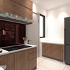 A sleek kitchen design by R Works from the RIMBAYU album, showcasing a contemporary modern style with clean lines and a minimalist color palette. Wood grain cabinetry provides warmth, complemented by dark countertops and state-of-the-art appliances. The space is optimized for functionality and aesthetics, reflecting the firm's expertise in high-end interior design in Malaysia.