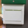 Thumb door release button