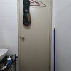 Thumb toilet door