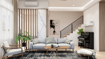 This elegant living space by HS Interior Design embodies contemporary Scandinavian style as showcased in their Ara Damansara collection. The room features a neutral color palette, with a plush gray sectional sofa, accented by wooden elements and lush green plants, enhancing the natural light-filled space. The chic, minimalist decor, such as the sleek black piano and artistic wall painting, adds sophistication to this serene Malaysian home interior.