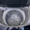 Thumb washing machine